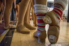 A tap dancer stretches her foot during a pause in rehearsals for Generations’ Christmas recital in early December. My Final Photo for Nov. 12, 2016.