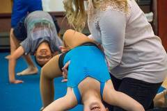 A dancer gets a little assistance during the tumbling portion of class at Generations. My Final Photo for Nov. 13, 2014.