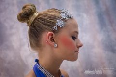 A Generations dancer waits her turn for photographs on the studio’s annual winter picture day when all the students pose in individual dance action and together in the larger dance groups. My Final Photo for March 1, 2017.