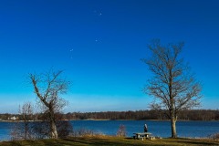 A woman watched eight helium-filled balloons float over Hoover Reservoir after she released the silent memorial from Red Bank Park at the lake on thanksgiving Day. My Final Photo for November 23, 2023. 