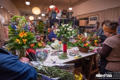 Florists at Talbott's Flowers in Uptown Westerville finish building Thanksgiving table centerpieces and a birthday centerpiece as they work toward the end of the day before the holiday. My Final Photo for November 22, 2023. 