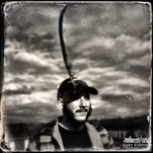 Man with feather in his cap portrait - iPhone Hipstamatic Tintype