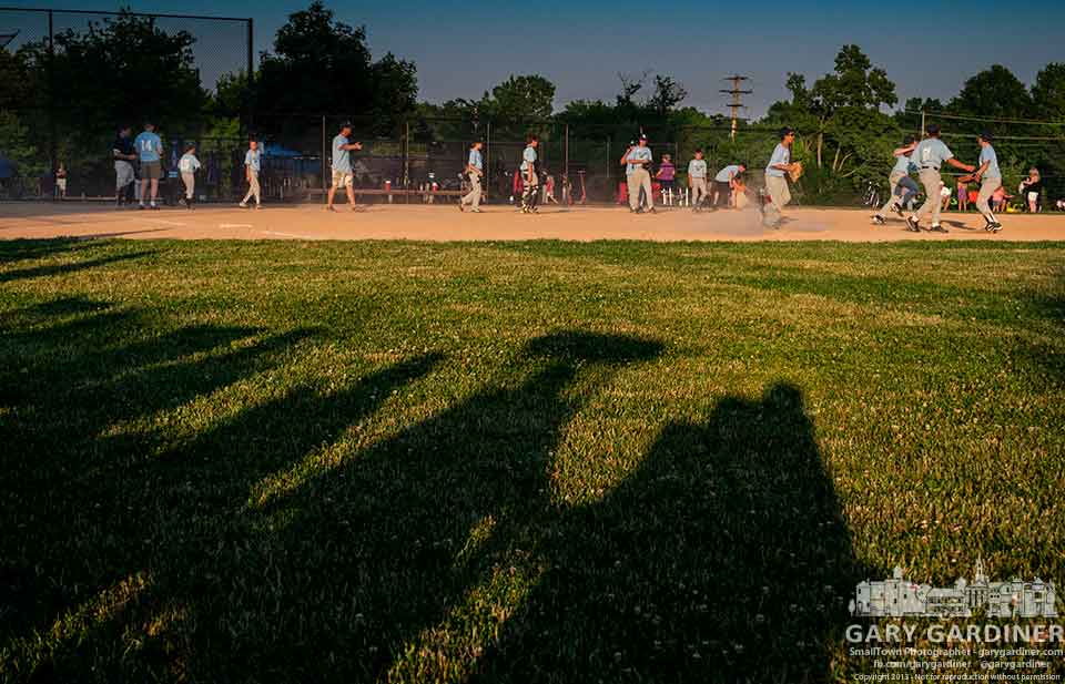 Shadows from family and friends spreads across the field as the winning team celebrates is  my Final Photo for June 20, 2013.