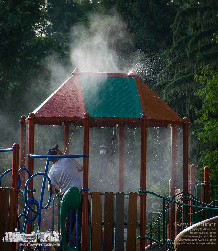 City workers power wash the new equipment at Alum Creek Park one day before the Part at the Creek celebrates the completion of the new playground. My Final Photo for May 27,  2015. 