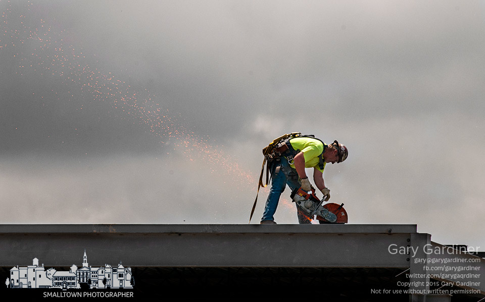 Steelworker creates spray of sparks