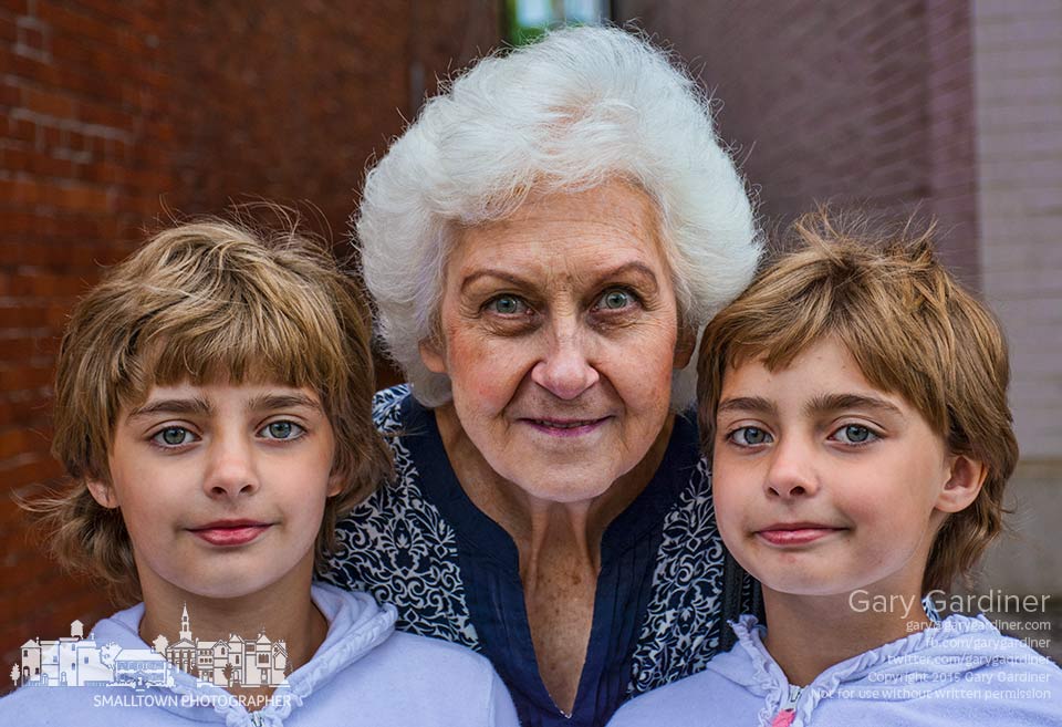 A grandmother and her twin granddaughters pause shopping in Uptown Westerville and pose for a quick photo. My Final Photo for Aug. 6, 2015.