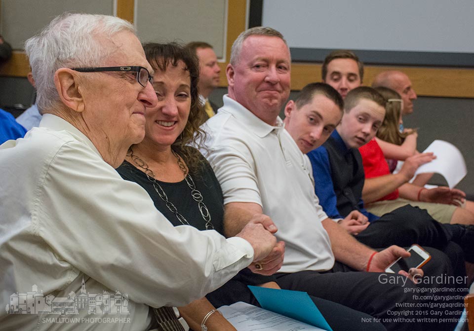 Retired educator and former Westerville North principal Jim McCann sits with his family after receiving the Champion Award from the city  during council meeting. My Final Photo for Sept. 1, 2015.