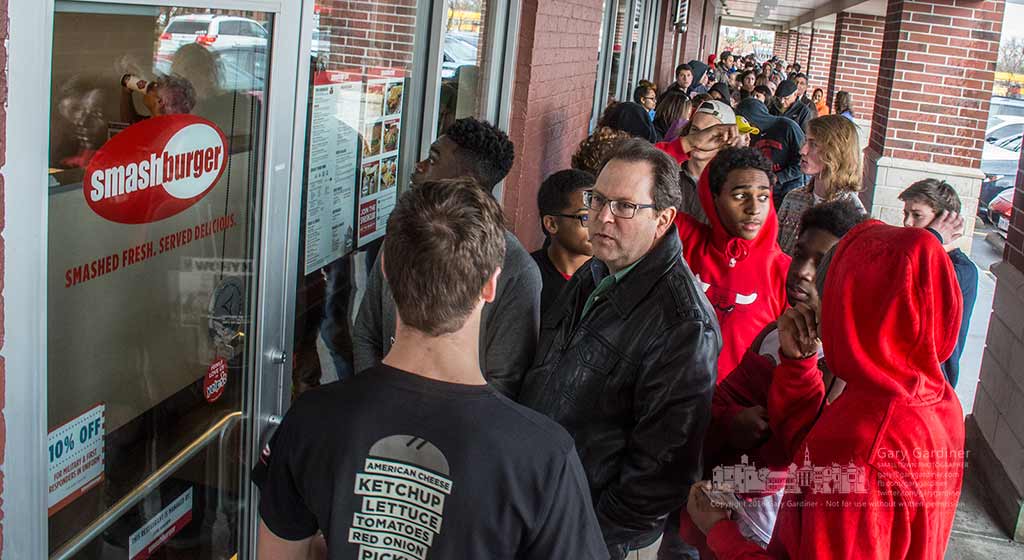 Hamburger fanatics form a line to the door of Smashburgers in Westerville where as part of its grand reopening was offering free hamburgers for eight hours. My Final Photo for February 24, 2016.