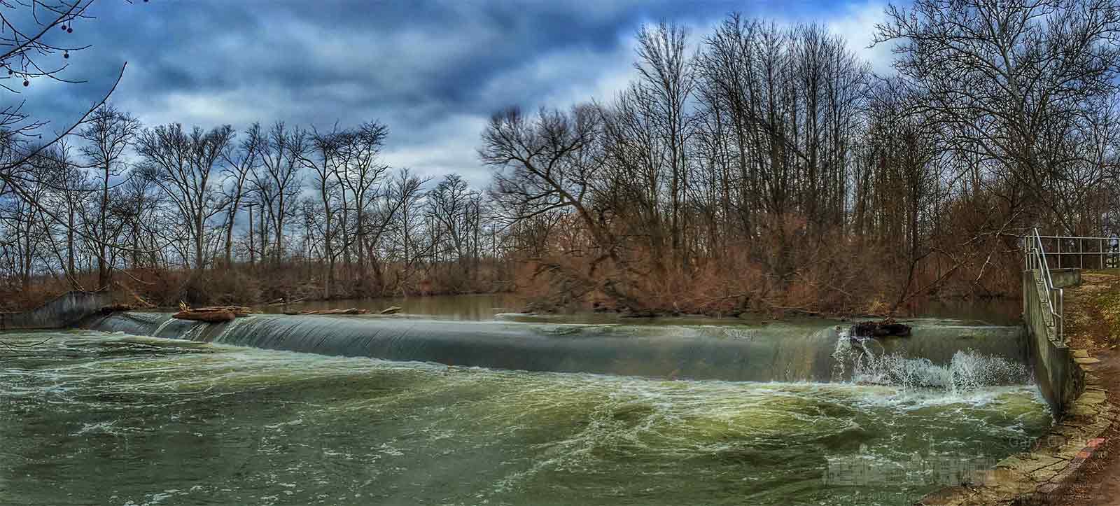 Water rushes over the spillway at Alum Creek North after another day of rain filled the creek as runoff from already soaked fields. My Final Photo for February 29, 2016.