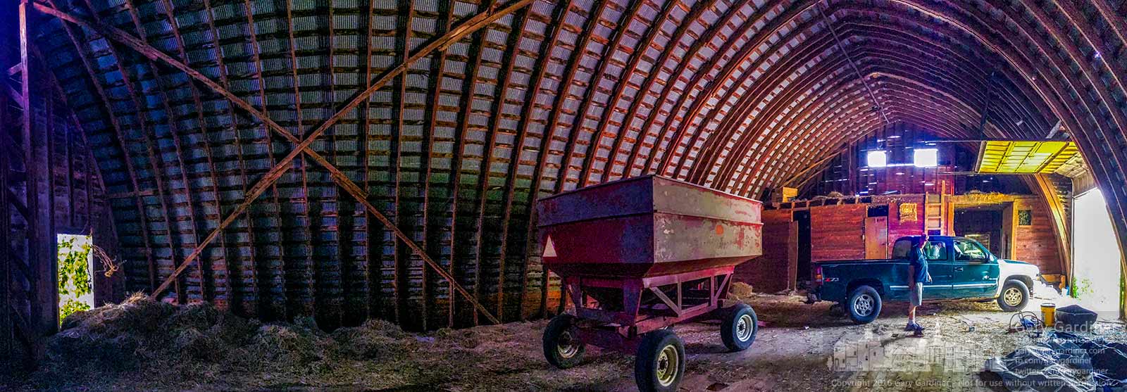 Farmers hook up the last trailer stored in the Braun Farm barn so they can take it back to their farm for storage and use this fall. My Final Photo for August 29, 2016.