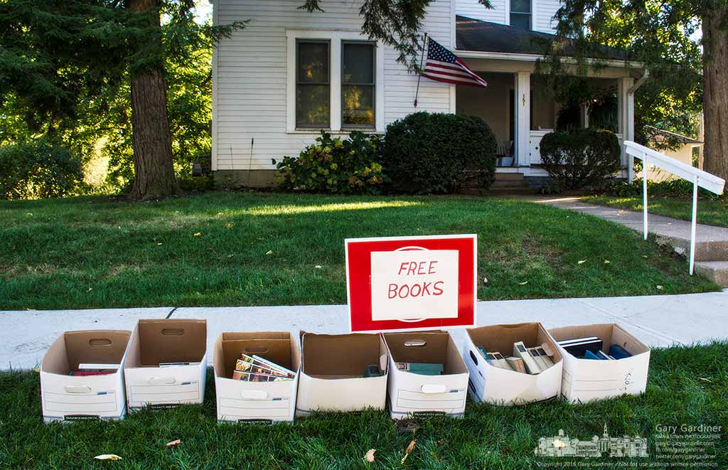 Boxes of free books line the curb at this home on East Plum Street behind Whittier Elementary. My Final Photo for Oct. 7, 2016.