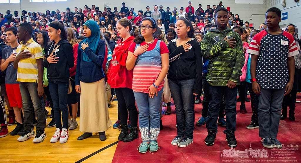 Heritage Middle School students begin the Pledge of Allegiance during Veterans Day ceremonies at the school by Westerville American Legion Young-Budd Post 271. My Final Photo for Nov. 11, 2016.