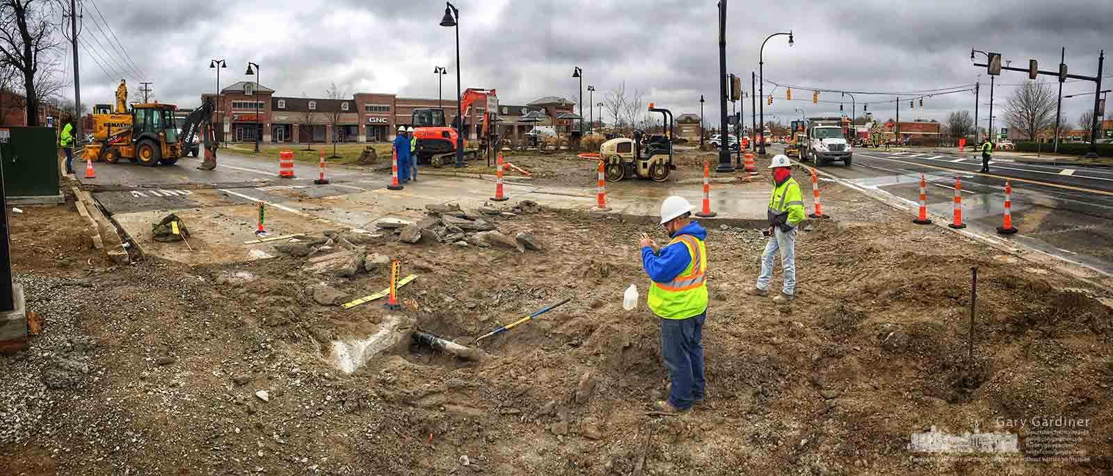 Construction and gas company workers inspect the patch on a four-inch gas line that was broken as the contractors removed the old entrance into Westerville Square shopping Center in Westerville. Ohio, forcing road closings for most of the morning. My Final Photo for Jan. 24, 2017.