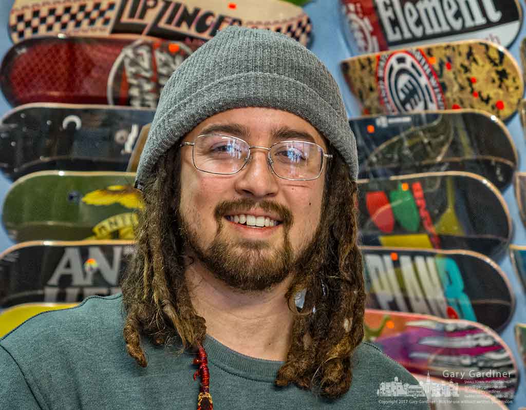 The prospects of skating on a mild winter day brings a smile to a skateboarder watching skater videos at Old Skool Skateshop in Uptown Westerville. My Final Photo for Jan. 31, 2017