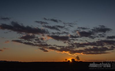 Sunset over the winter farm