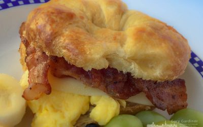 Breakfast Blue Plate Special – Croissant, Bacon, and Egg Sandwich