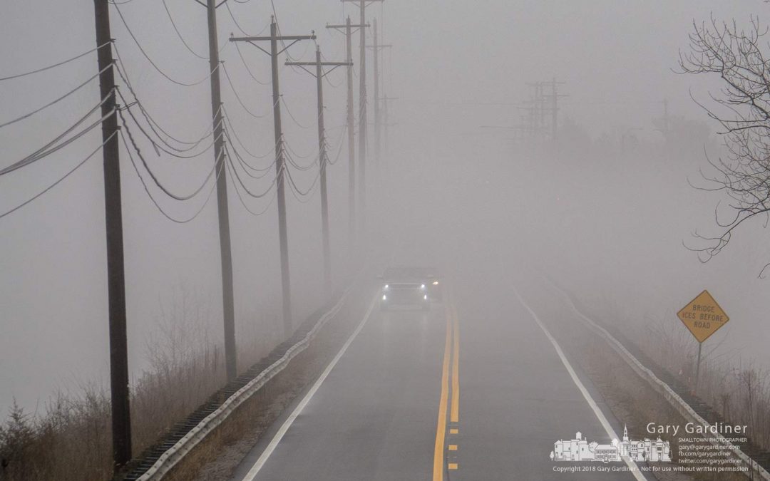 Bridge Over Foggy Waters