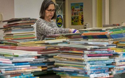 Sorting through the water damaged books