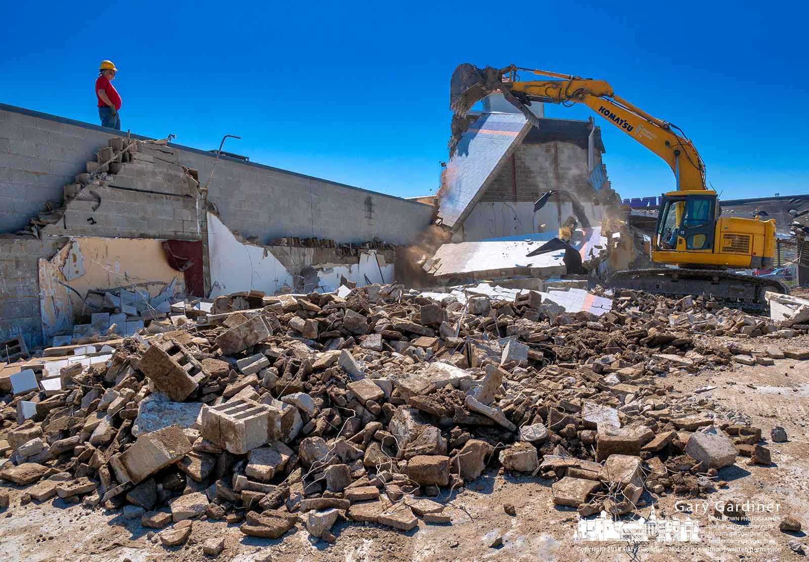 A demolition crew pulls down a section of the last remaining wall of the Hollywood Studio Theater in Glengary Shopping Center to make way for a new Aldi grocery store. My Final Photo for April 30, 2018.