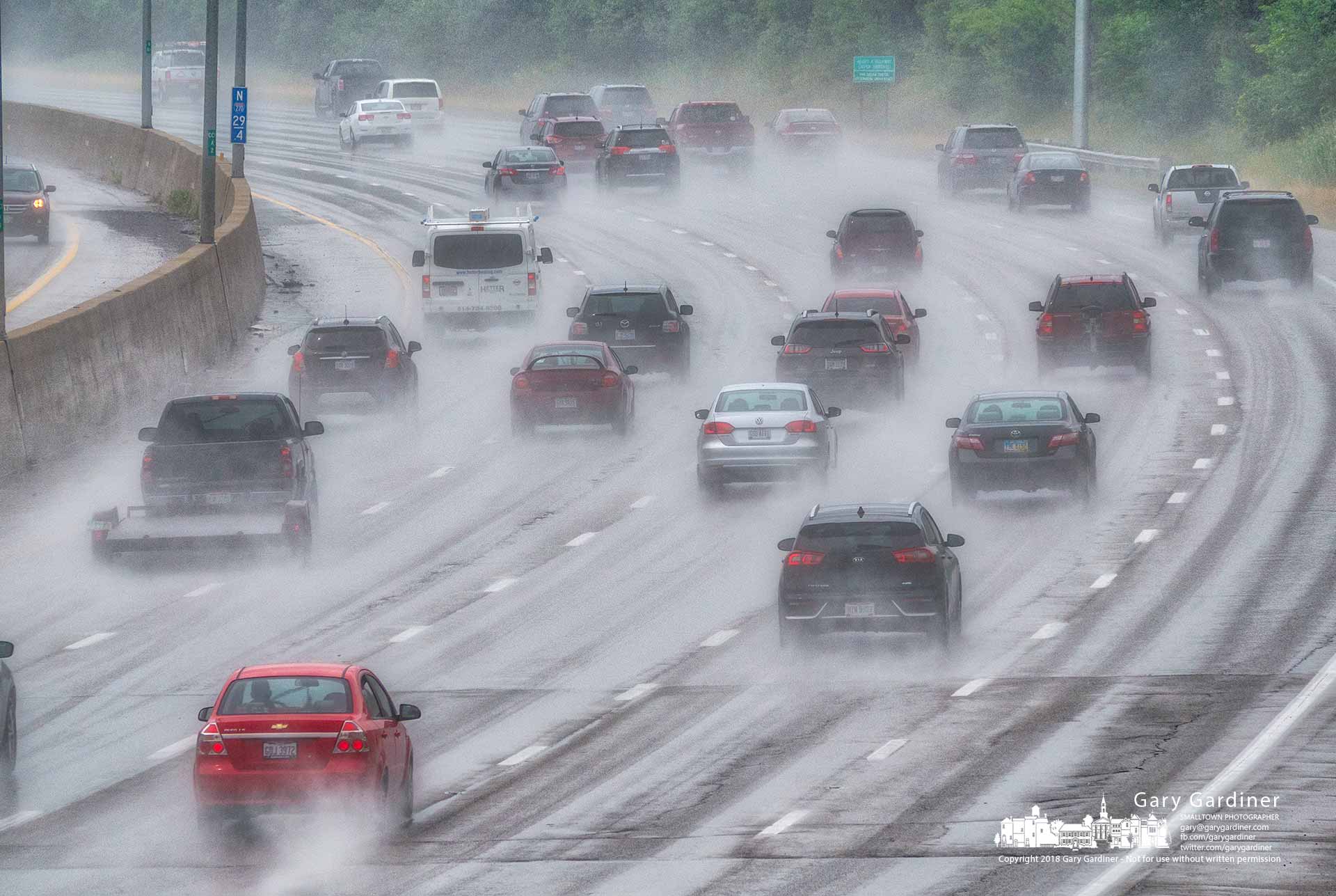 Travelers navigate their way through an afternoon rain storm as they travel along I-270 near Westerville. My Final Photo for July 20, 2018.