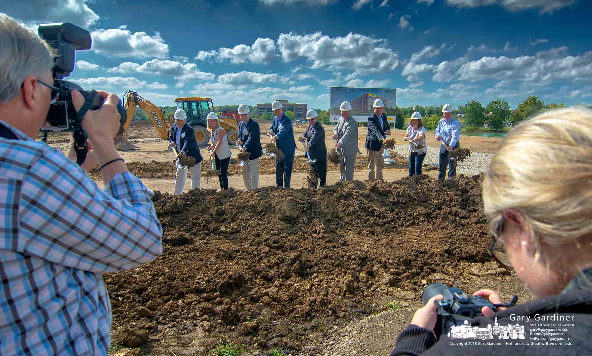 A pair of photographers record the ceremonial groundbreaking for the new DHL Supply Chain headquarters by company executives and the city of Westerville. My Final Photo for Sept. 14, 2018.