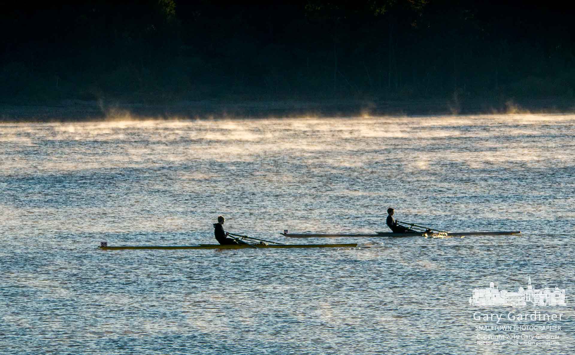 A pair of rowers move into position for the start of one of the races in The Hoover - Columbus Fall Classic rowing regatta Saturday morning on Hoover Reservoir. My Final Photo for Oct. 12, 2019.