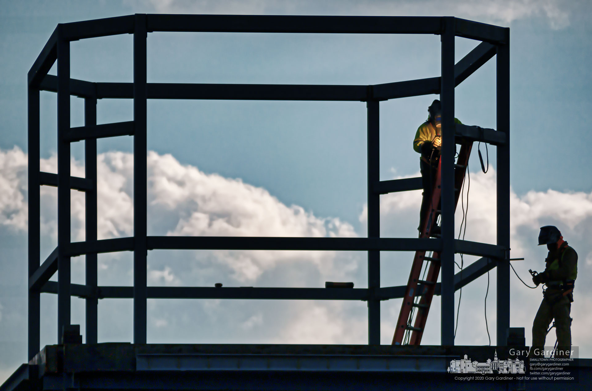 A welder is illuminated by the light from work building a section of the roof structure for a commercial building on Polaris Parkway. My Final Photo for Jan. 16, 2020.