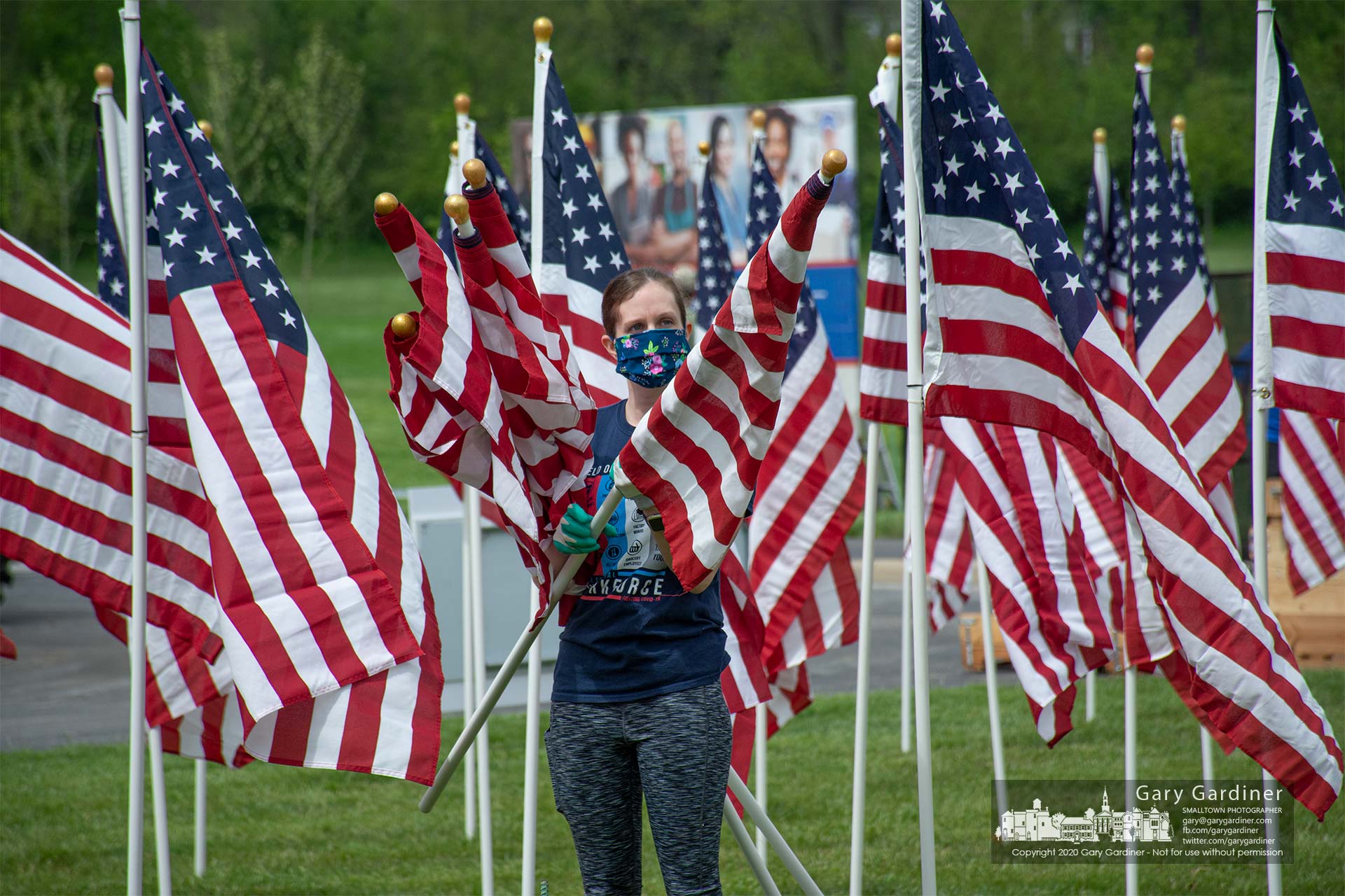 Volunteers from Sunrise Rotary place 3,000 flags into the sports fields on Cleveland Avenue for Field of Heroes celebration over the Memorial Day weekend. My Final Photo for May 22, 2020.