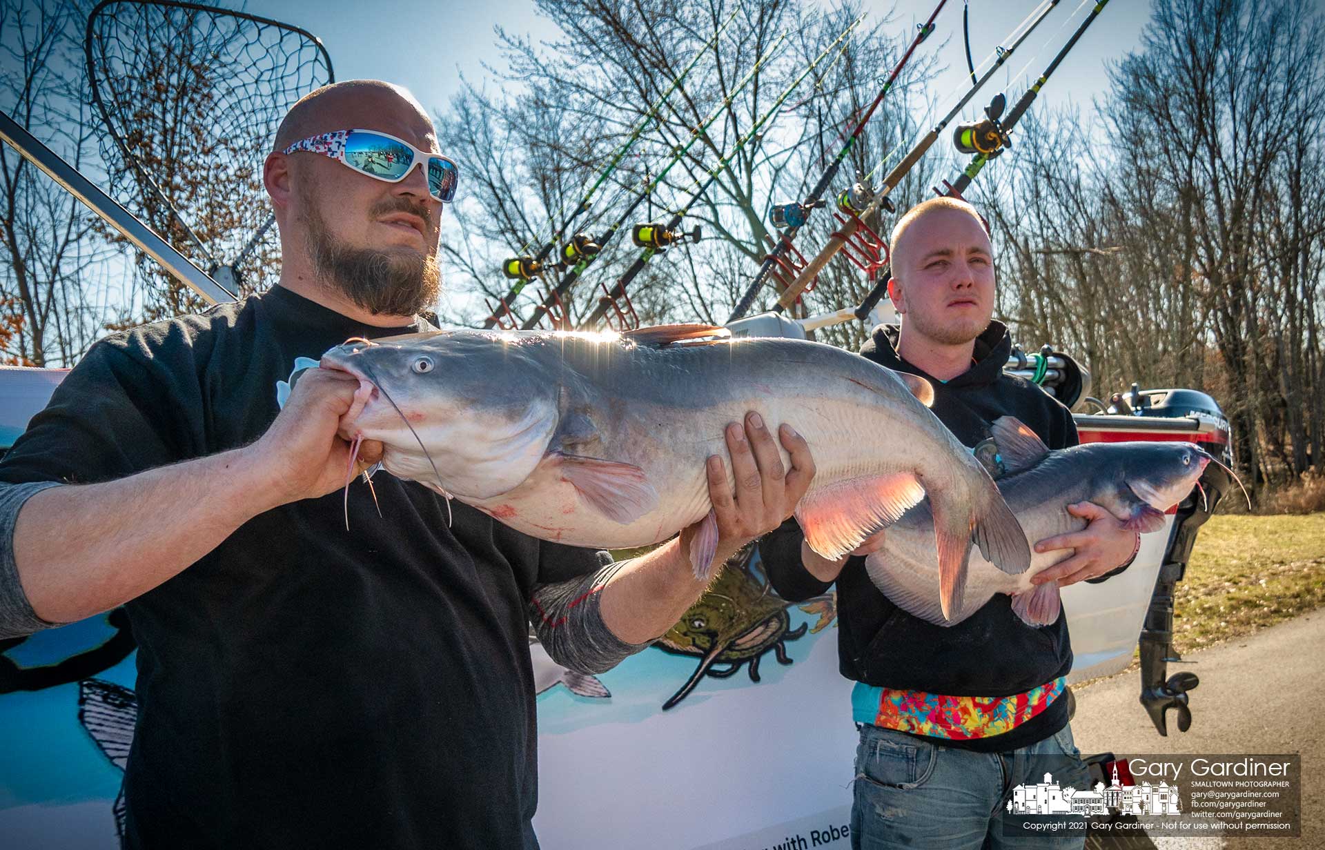 Fishermen hold more than 36 pounds of catfish pulled from Hoover Reservoir Saturday making the two fish the largest aggregate catch of the afternoon. My Final Photo for March 20, 2021.