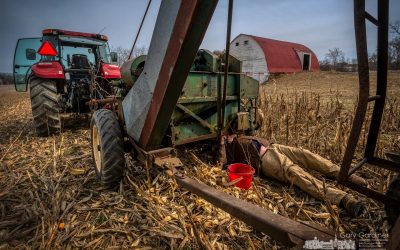 Farmer Fixing The Tools