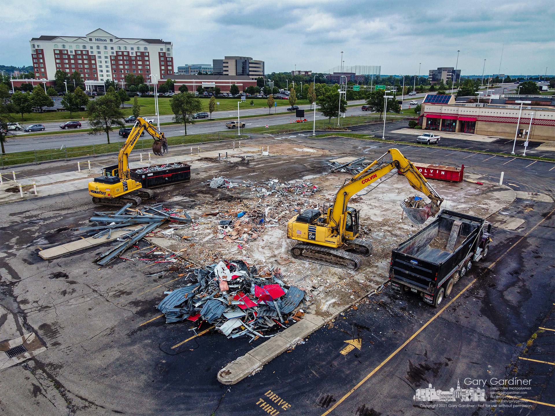 A demolition crew works to clear the final pieces of the convenience store/gas station at Polaris and Lyra where Sheetz plans to build a new market and gas station. My Final Photo for Aug. 10, 2021.