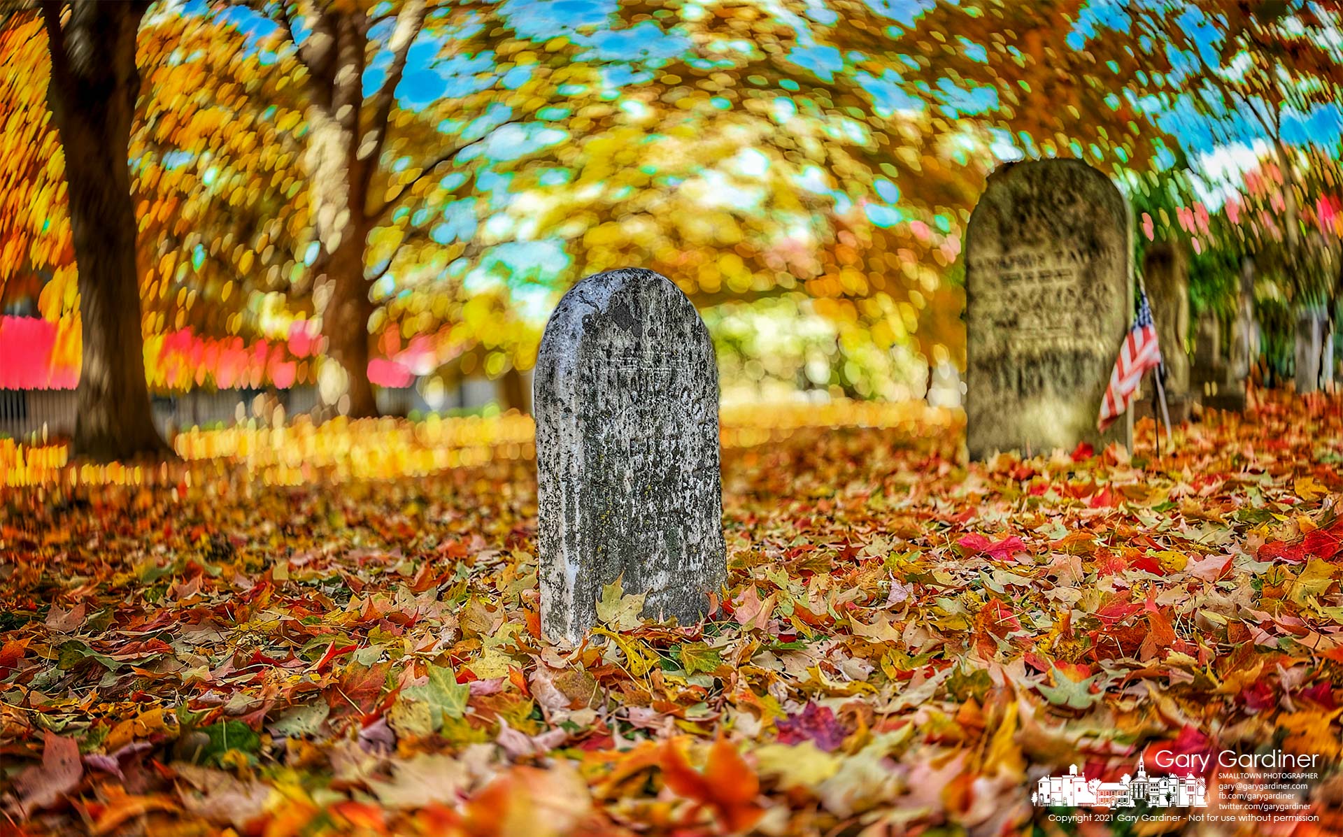 Gold, red, and yellow maple leaves blanket some of the oldest headstones at the Old Methodist Cemetery on East Lincoln Street. My Final Photo for Nov. 3, 2021.