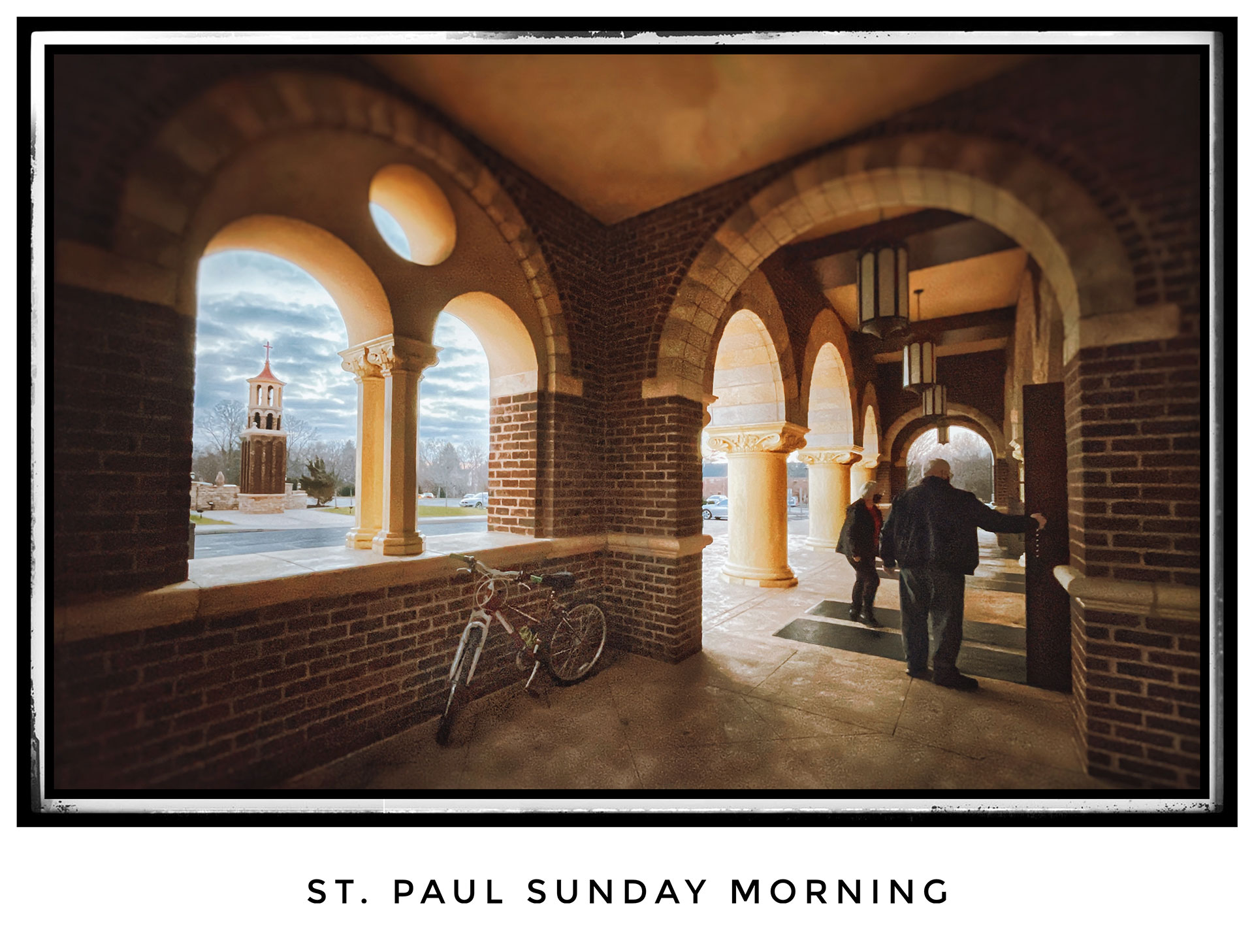 A parishioner's bicycle leans against the wall of the portico of St. Paul the Apostle Catholic Church as two more parishioners arrive for Sunday Mass. My Final Photo for Dec. 26, 2021.
