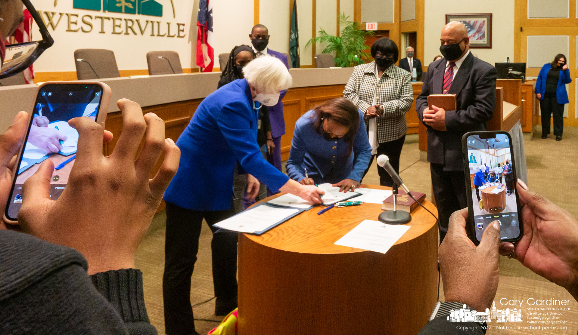 Newly sworn-in Westerville City Councilwoman Coutanya Coombs signs paperwork certifying her status on the council. My Final Photo for Jan. 4, 2022.