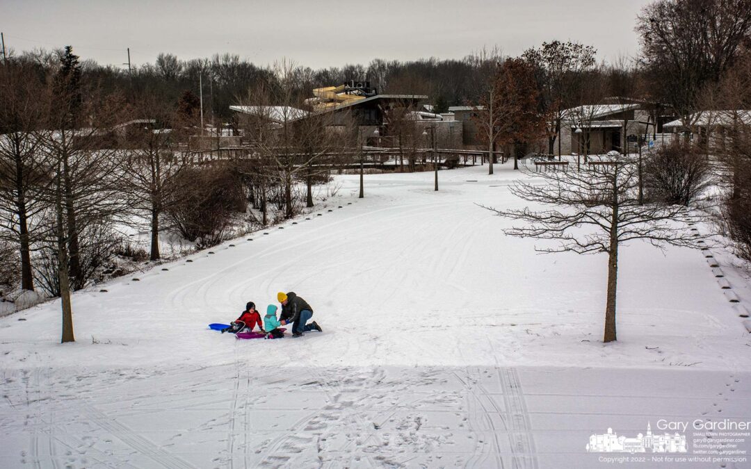 Gloves On For The Sledding Hill