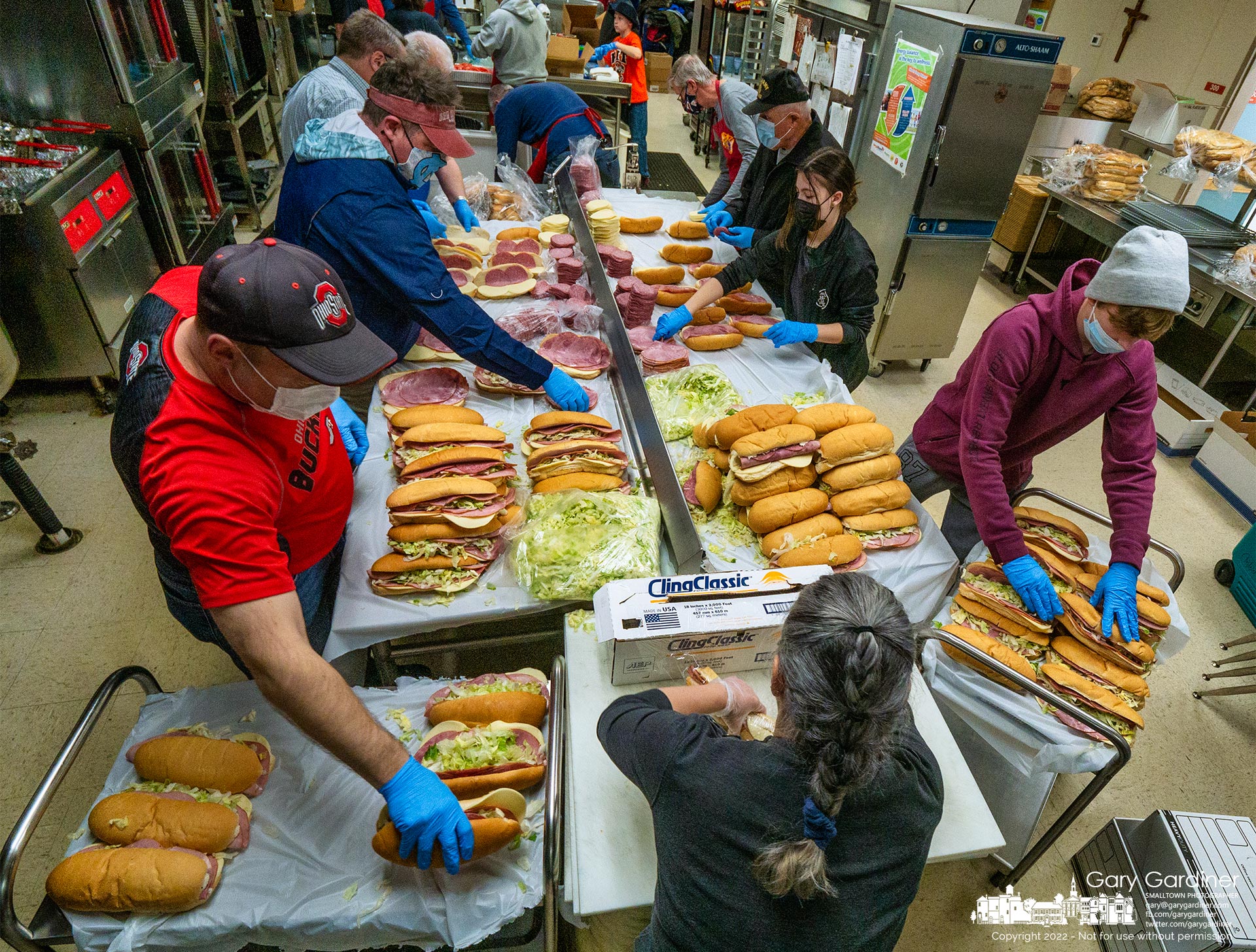 Members of the Knights of Columbus and volunteers make 50 dozen sub sandwiches to sell as a fundraiser after Masses at St. Paul the Apostle Church this weekend. My Final Photo for Feb. 12, 2022.