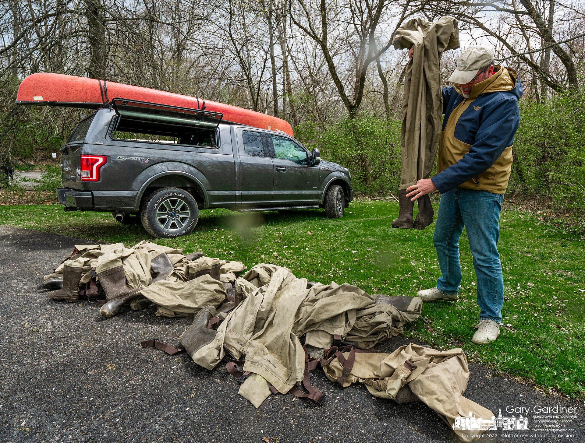 An Otterbein University professor loads unused waders into his vehicle after deciding to remove studying the ecology of Alum Creek for his next class due to the cold weather and water. My Final Photo for April 19, 2022.