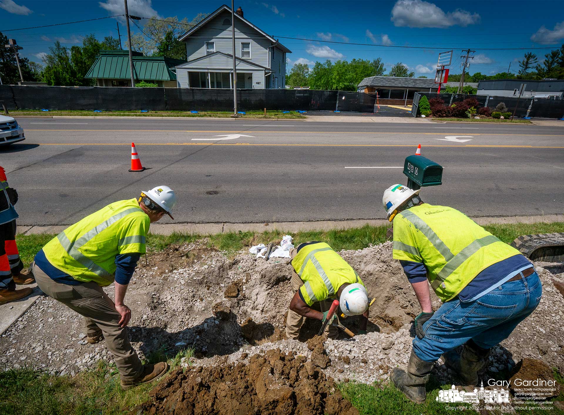 Columbia Gas workers search for a connection to cap off the gas line that feeds a house across the street that is set for demolition to make way for a Dunkin doughnuts drive-through restaurant on South State Street. My Final Photo for May 16, 2022.