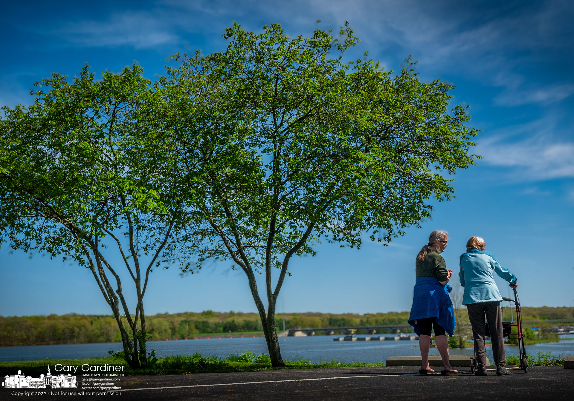 Belle, right, a 95-year-old mother, walks with her daughter to the edge of a parking lot overlooking Hoover Reservoir and the dam as they spend time together outside on Mother's Day. My Final Photo for May 8, 2022.