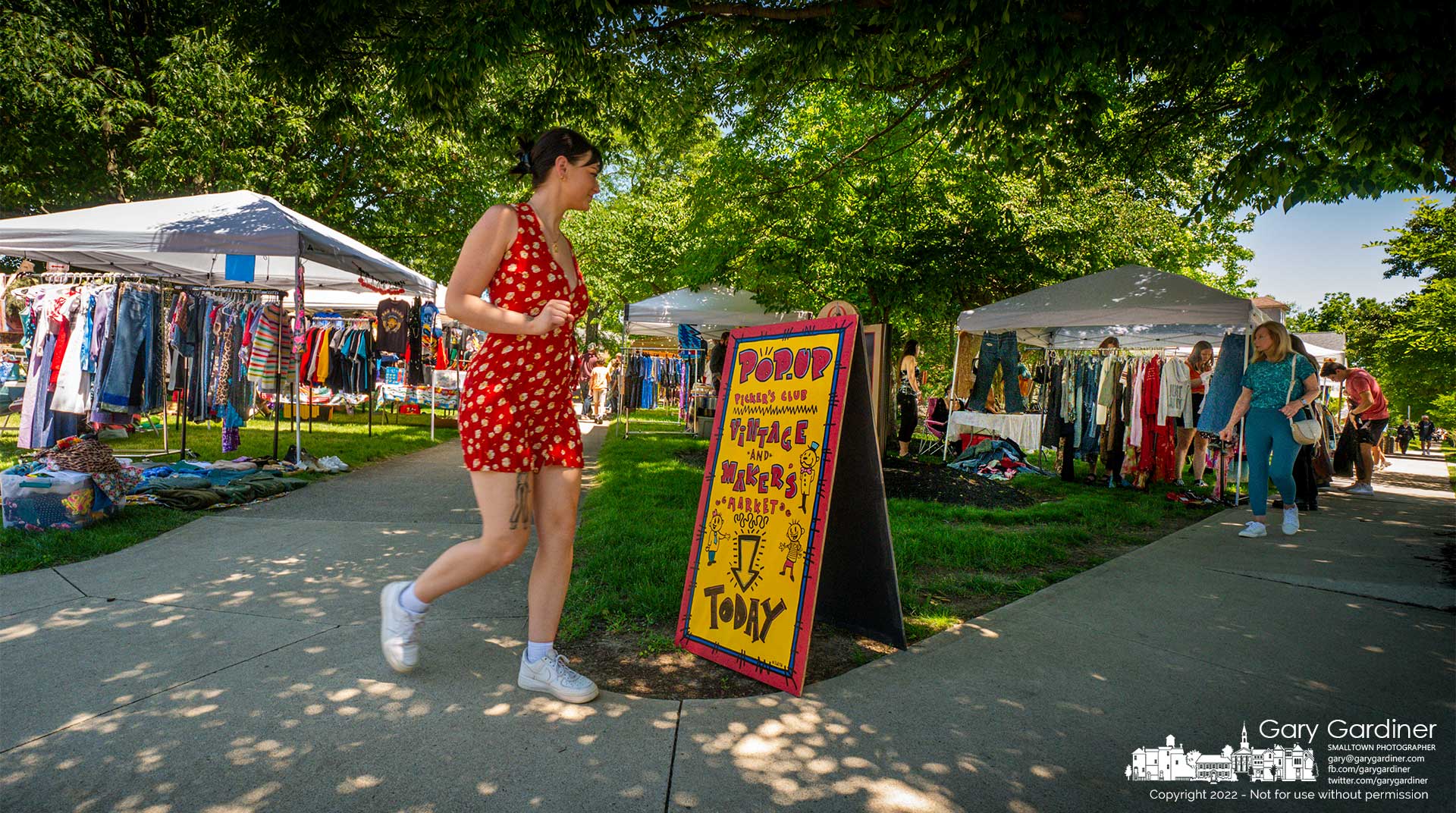 Shoppers sort their way through a selection of vintage and maker's booths at West Main and Grove Street during a popup market at Otterbein University. My Final Photo for June 4, 2022.