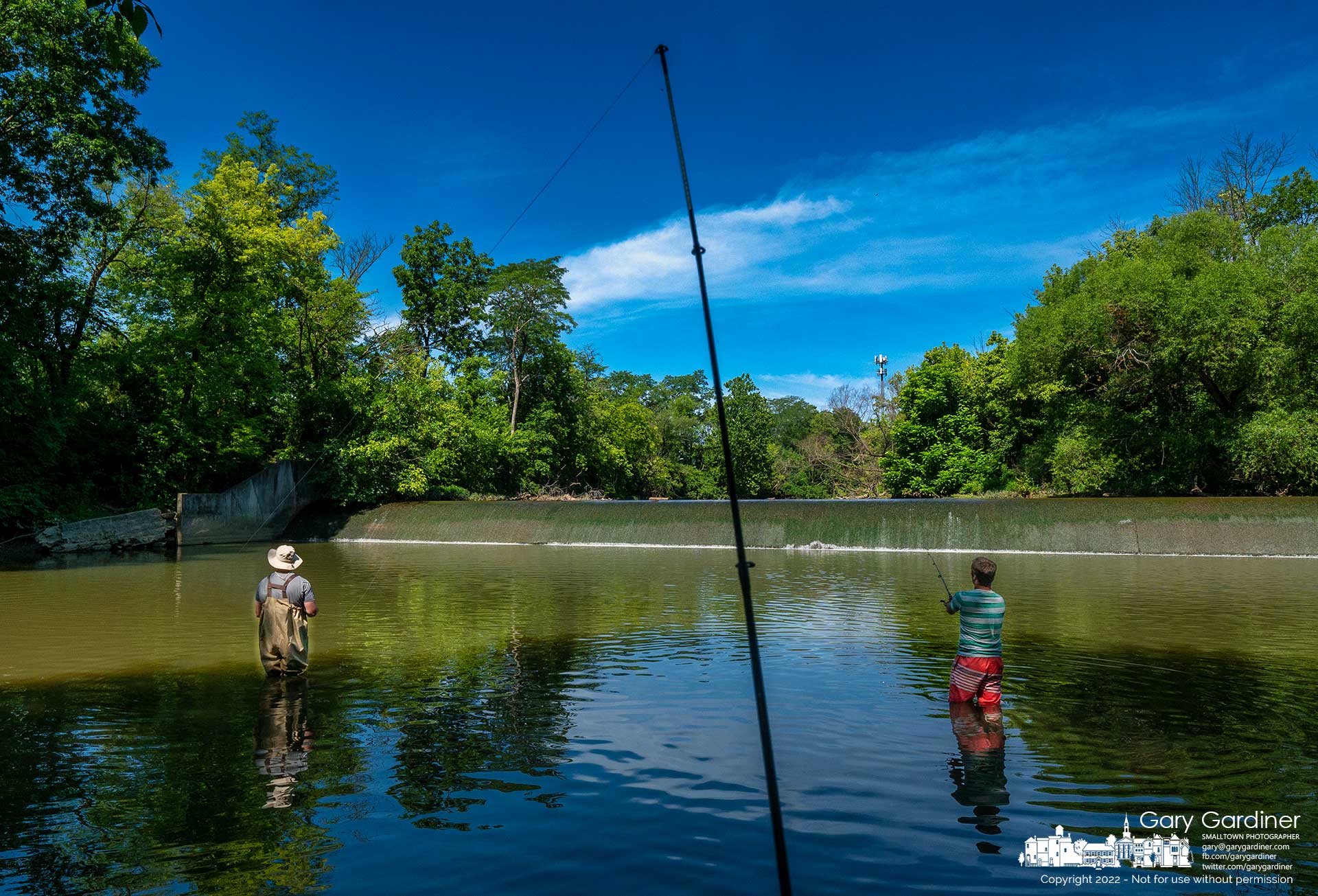 A pair of fisherman cast for muskie just below the spillway at the Alum Creek Park low-head dam. My Final Photo for July 15, 2022.
