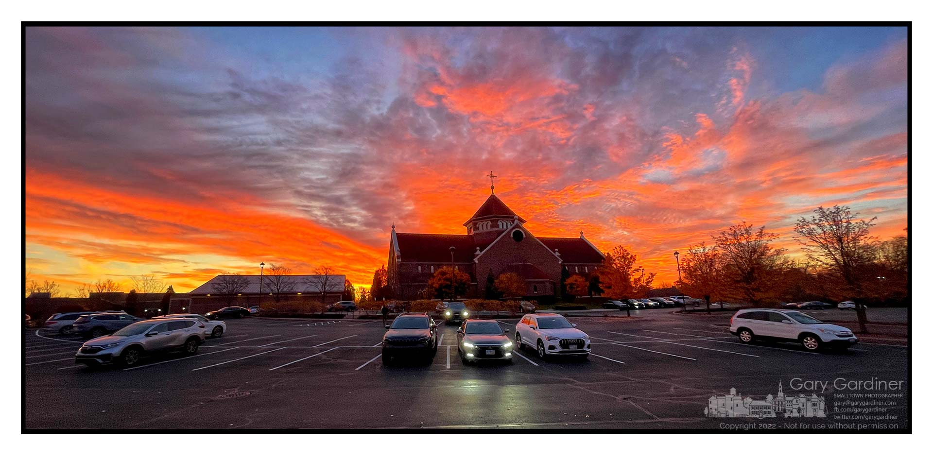 The morning sun creates a bright, colorful sky as parishioners arrive for the first Mass of the day at St. Paul the Apostle Catholic Church in Westerville, Ohio. My Final Photo for October 29, 2022.