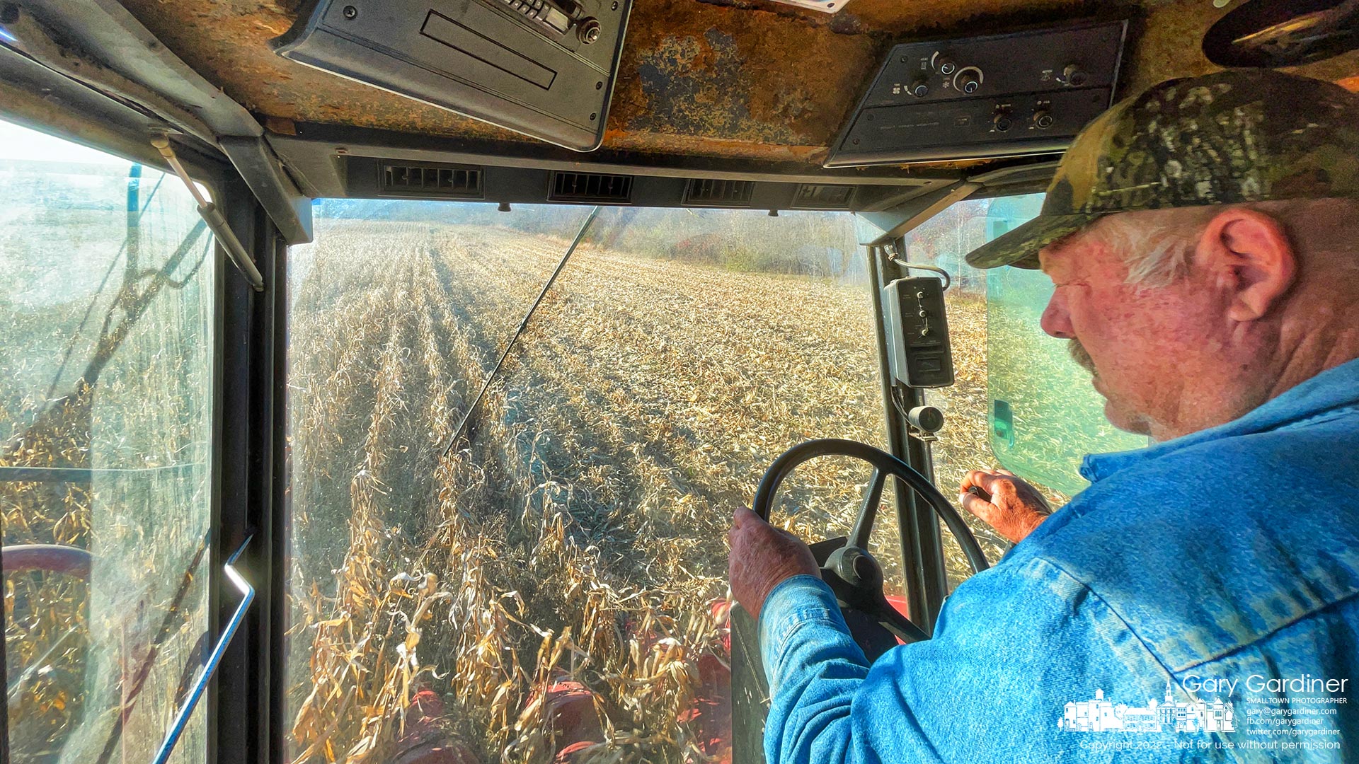 Kevin Scott runs his combine through the corn field at the Braun Farm hoping to complete the harvest before Thanksgiving. My Final Photo for November 22, 2022.