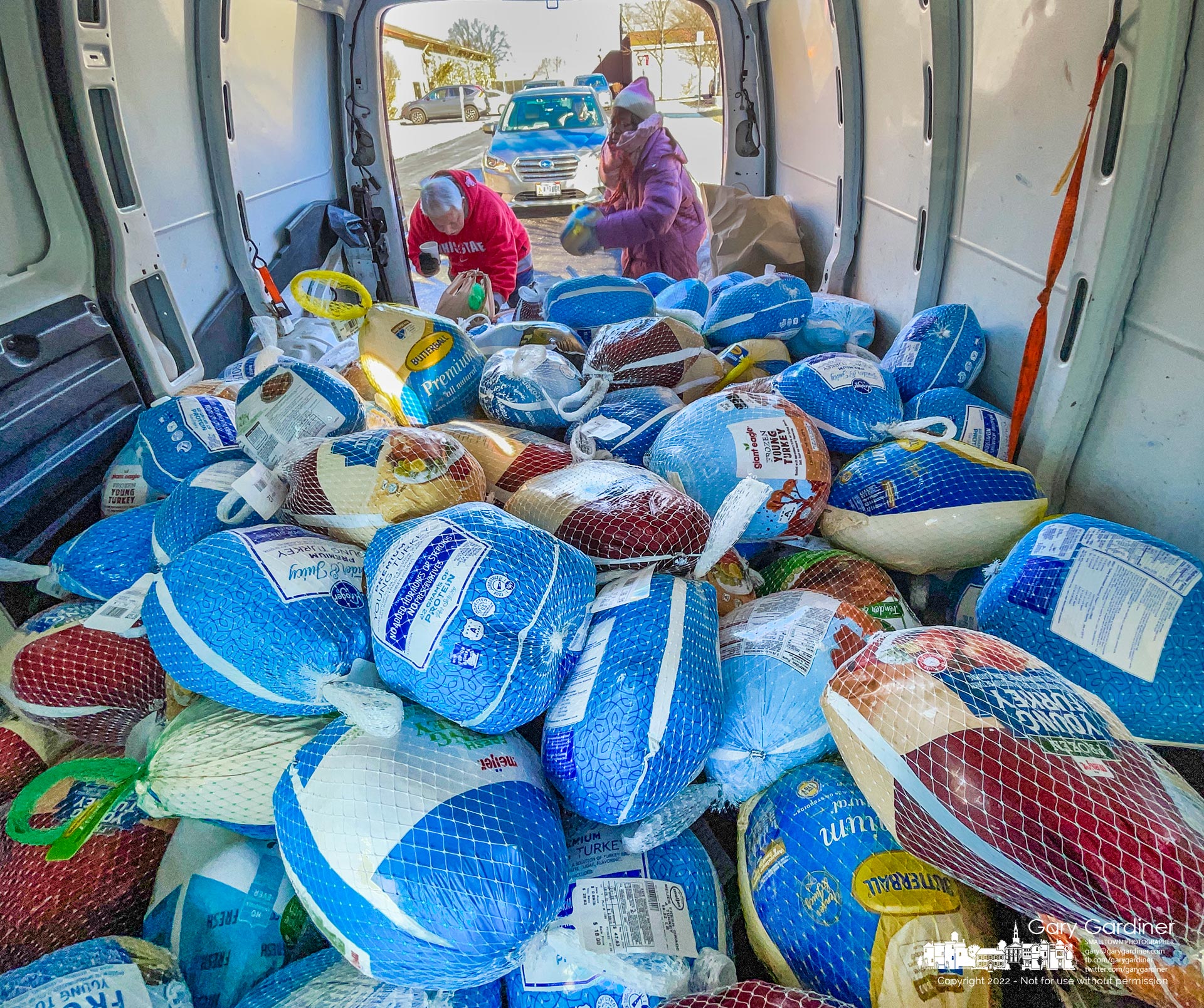 Frozen turkeys are stacked in a van at St. Paul the Apostle Catholic Church where they will be delivered to Holy Rosary/St. John Catholic Church in downtown Columbus for the church's food kitchen at Thanksgiving. My Final Photo for November 20, 2022.