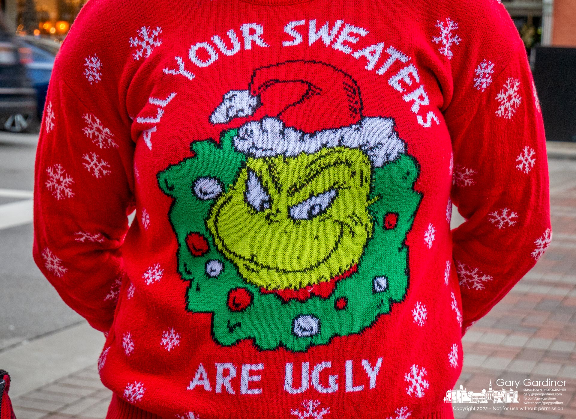 It was Ugly Christmas Sweater Sunday in Uptown Westerville and although there wasn't a declared winner this Scroogish Grinch-centered sweater stood out from all that appeared. My Final Photo for December 11, 2022.