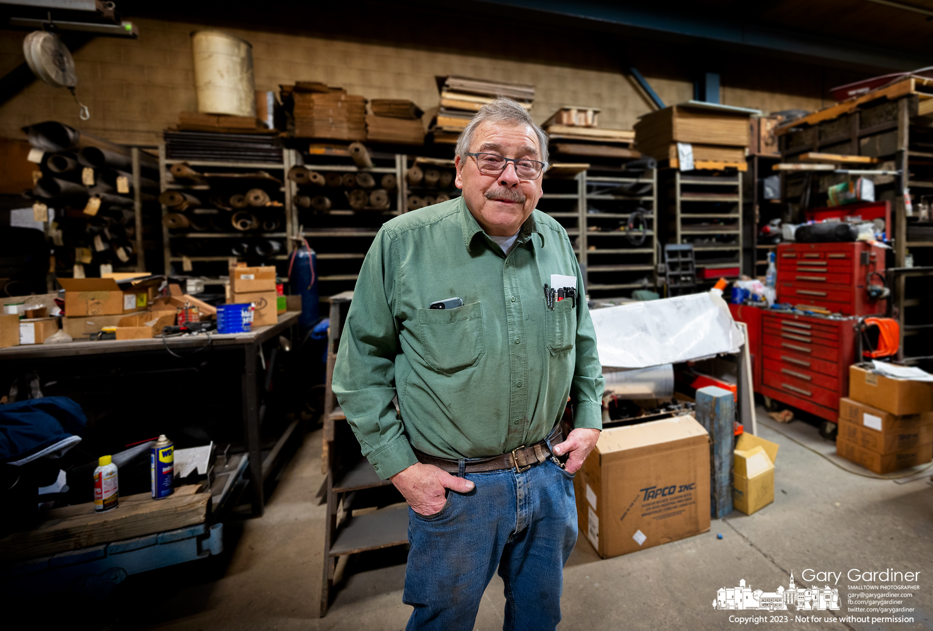 Jim Hance stands in his company workshop where he's helping clear out tools and equipment sold in an online auction as En-Hanced Products closes its doors after more than 100 years manufacturing industrial equipment, agricultural seed sorters, and GoCycles. My Final Photo for January 24, 2023.