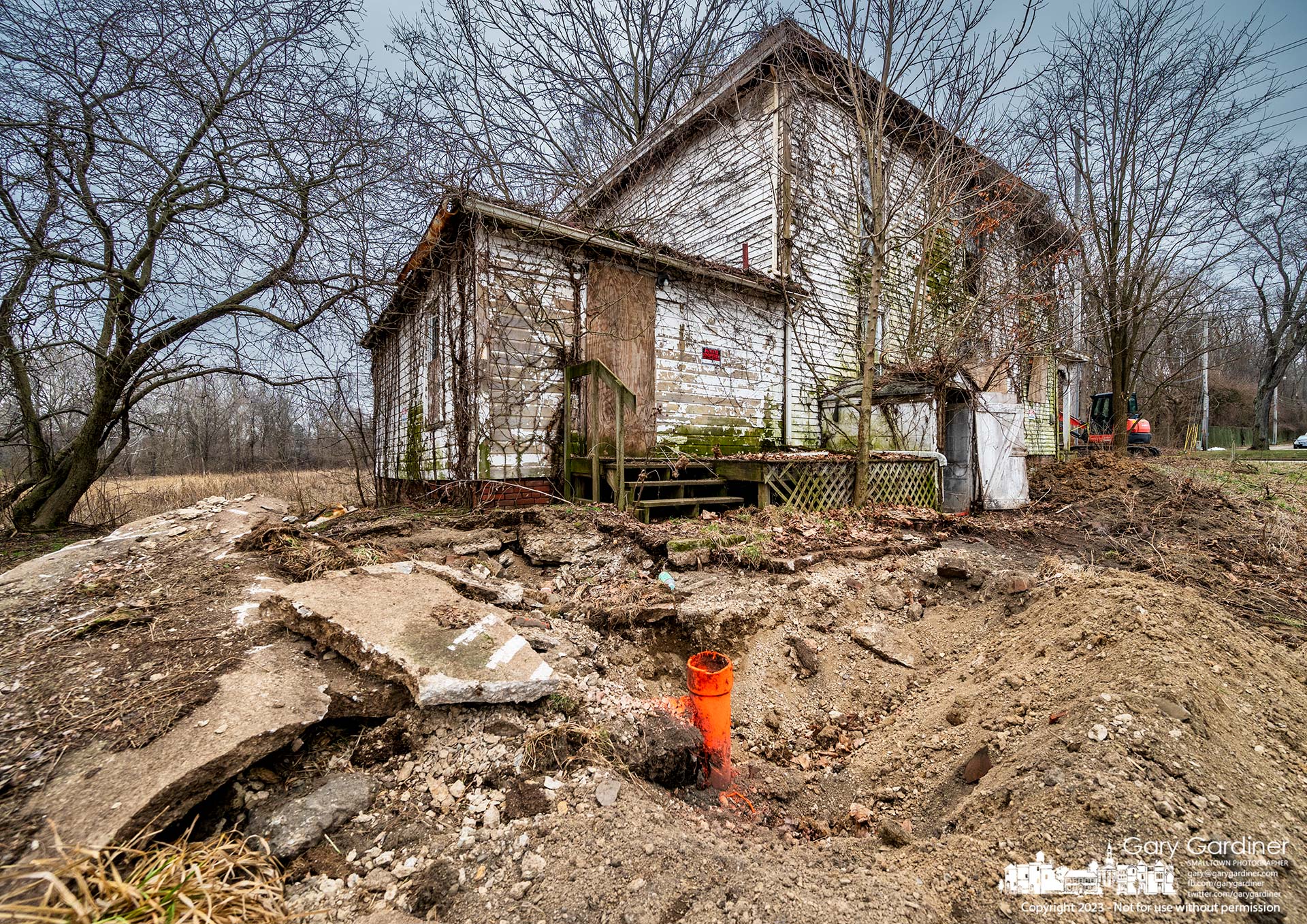 Contractors wait for final approval to demolish the Braun Farm barn and house where the utilities have been clearly marked for final inspection before tearing down the buildings. My final Photo for February 6, 2023.