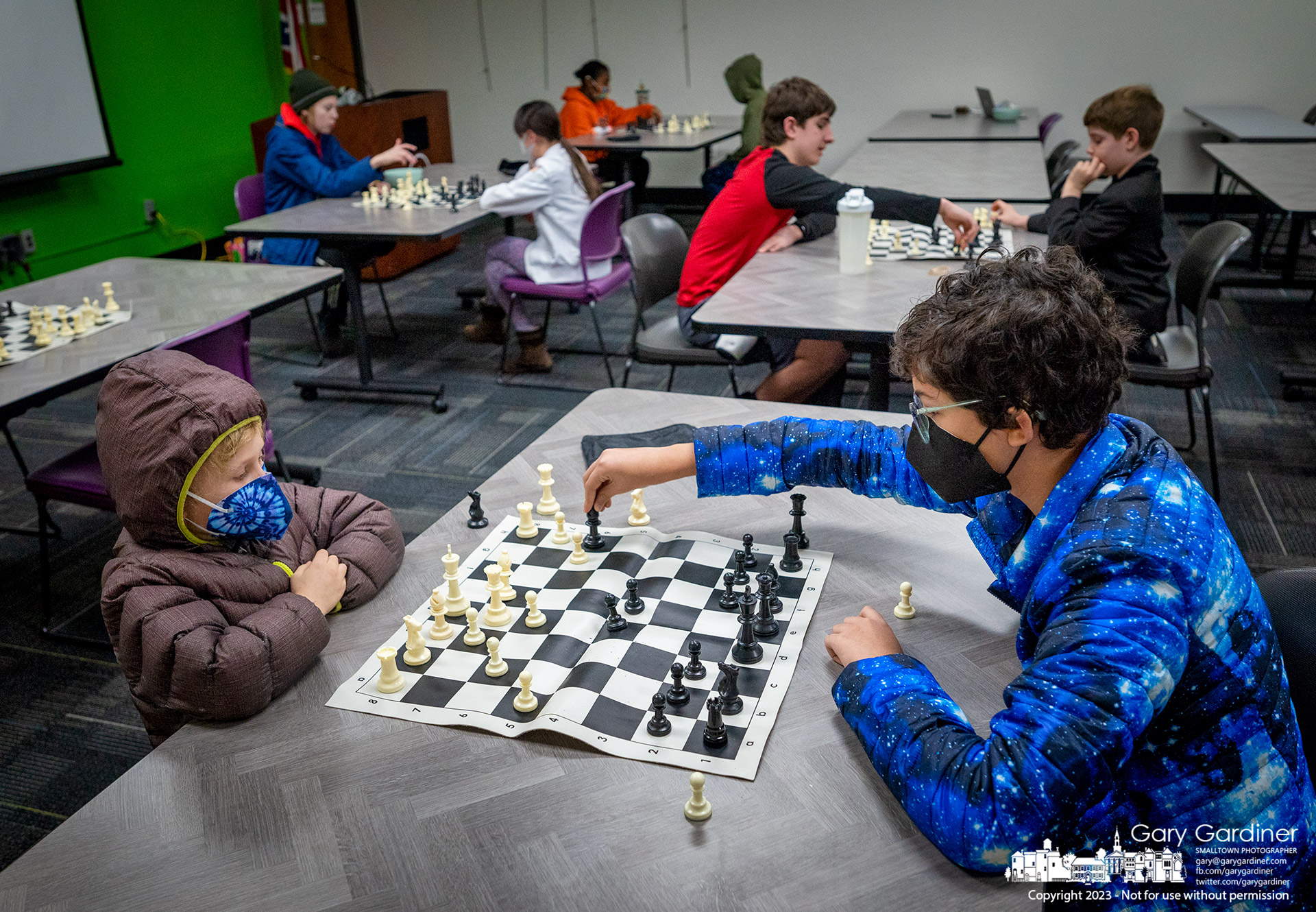 A member of the Knights of Westerville, a youth chess group, moves his bishop to H6 as his opponent studies both that move and his next during matches Wednesday afternoon at the Westerville library. My Final Photo for February 1, 2023.