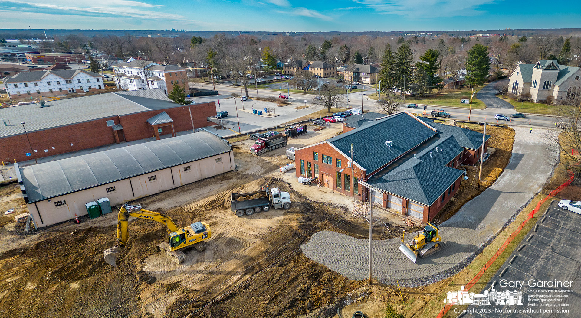 A grading crew builds a new entrance to the old Westerville Armory where CoHatch is building an office center and North Hgh Brewing is expanding its brewery operation into the old warehouse beside what will be the new concrete parking lot. My Final Photo for February 13, 2023.