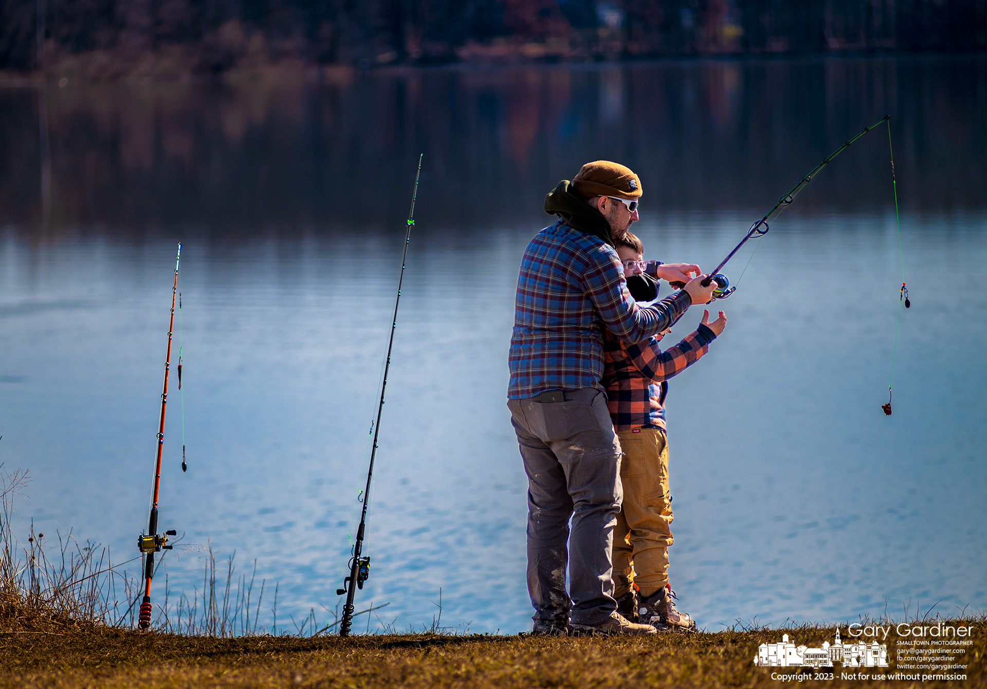 A father instructs his son in the proper casting technique about halfway through their day fishing off the shoreline at Red Bank Park on Hoover Reservoir. My Final Photo for February 11, 2023.